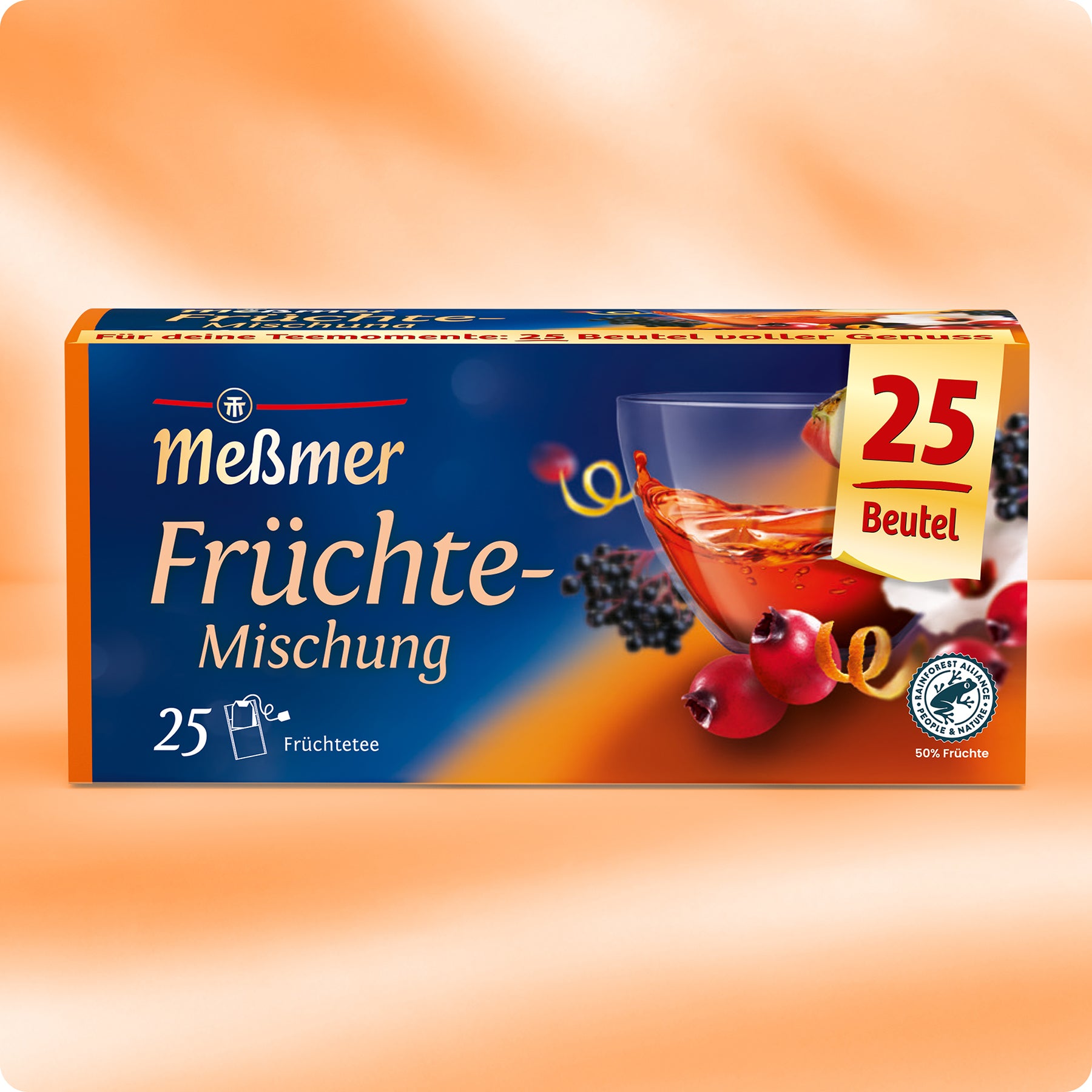 Schachtel Meßmer DE Früchte-Mischung Tee mit 25 Beuteln Hibiskus- und Holunderfrüchtetee. Die Verpackung zeigt ein Glas roten Tee, verschiedene Früchte und das Rainforest Alliance Certified-Siegel.