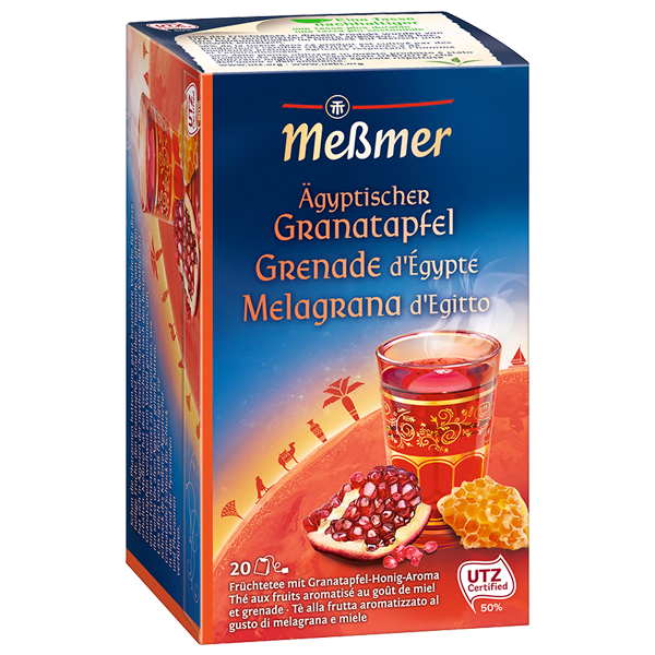Meßmer Ägyptischer Granatapfel Früchtetee mit Granatapfel-Honig-Aroma, verpackt mit Motiv von Granatapfel, Honigwabe und orientalischem Glas vor ägyptischem Hintergrund.