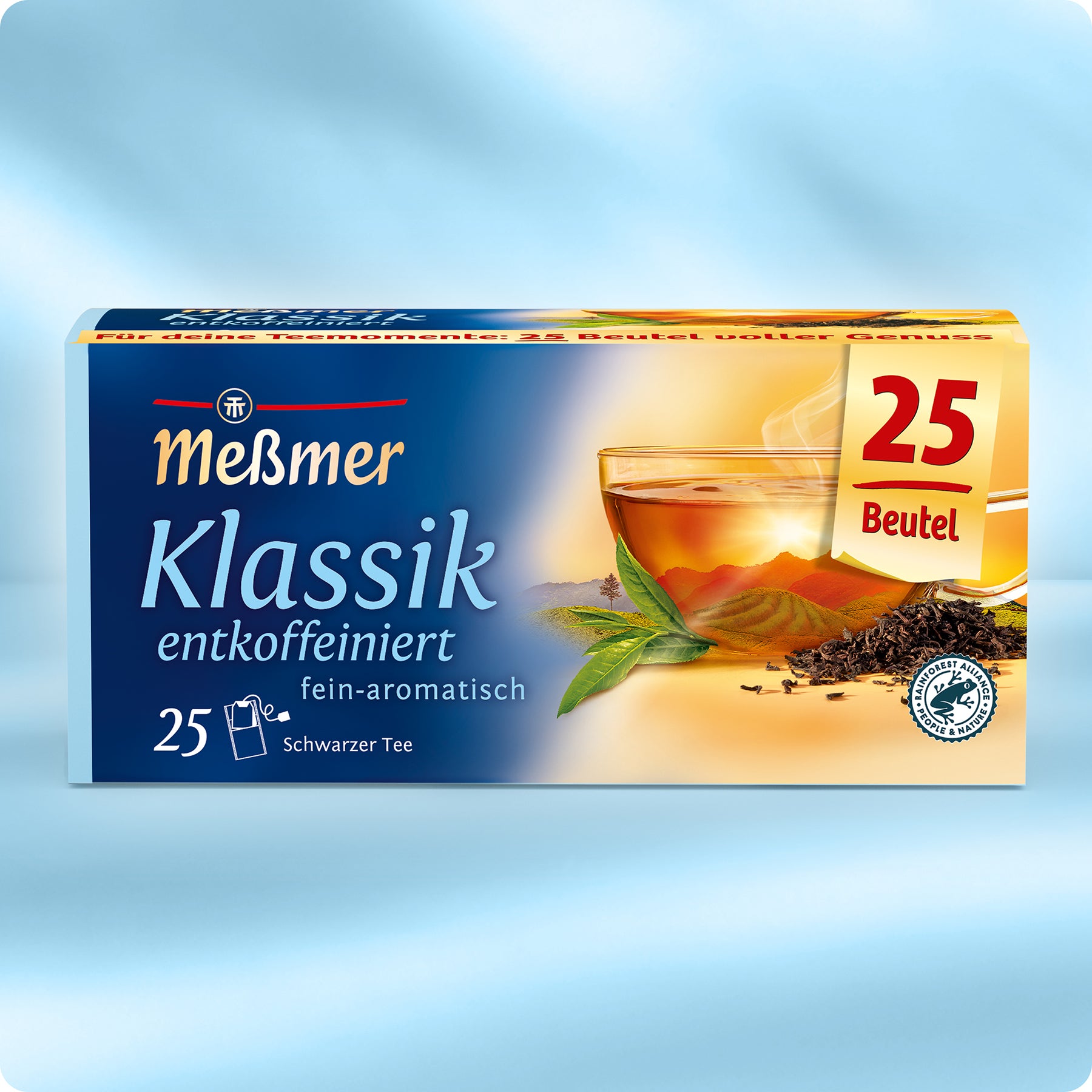 Eine Schachtel Meßmer DE Klassik entkoffeiniert enthält 25 Teebeutel. Die blau-gelbe Verpackung zeigt eine dampfende Tasse, Teeblätter und einen deutschen Text. Genießen Sie den klassischen Geschmack von koffeinfreiem Schwarztee.