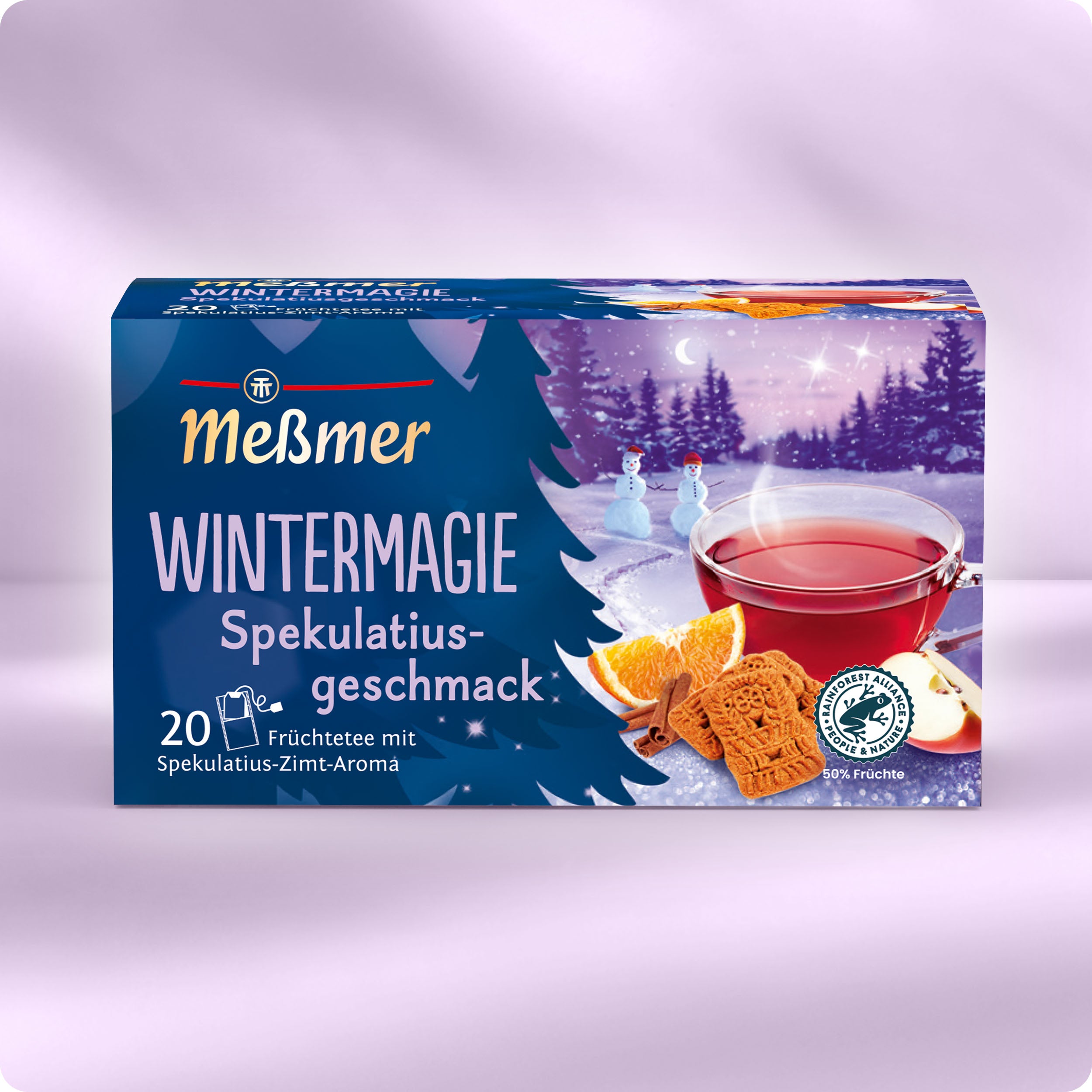 Eine Schachtel Meßmer DE Wintermagie, ideal für winterlichen Genuss, zeigt Verpackungen mit einem Glas Tee, Orangenscheiben, Spekulatius, Schneebäumen und Schneemännern.